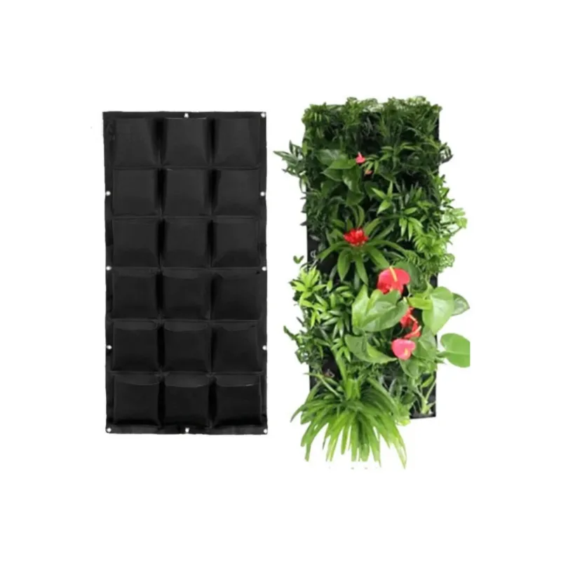 A black planting bag with plants and flowers growing inside.