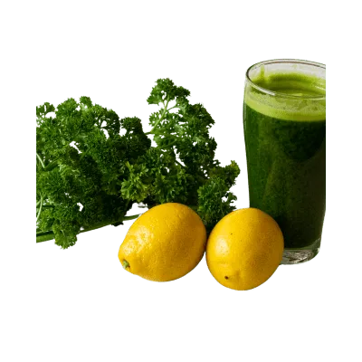 Drip Irrigation Systems in Kenya 33 Fresh parsley and lemon placed next to a glass of parsley and lemon-infused drink.
